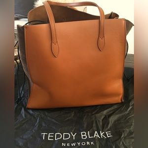 Teddy Blake New York Camel colored tote.